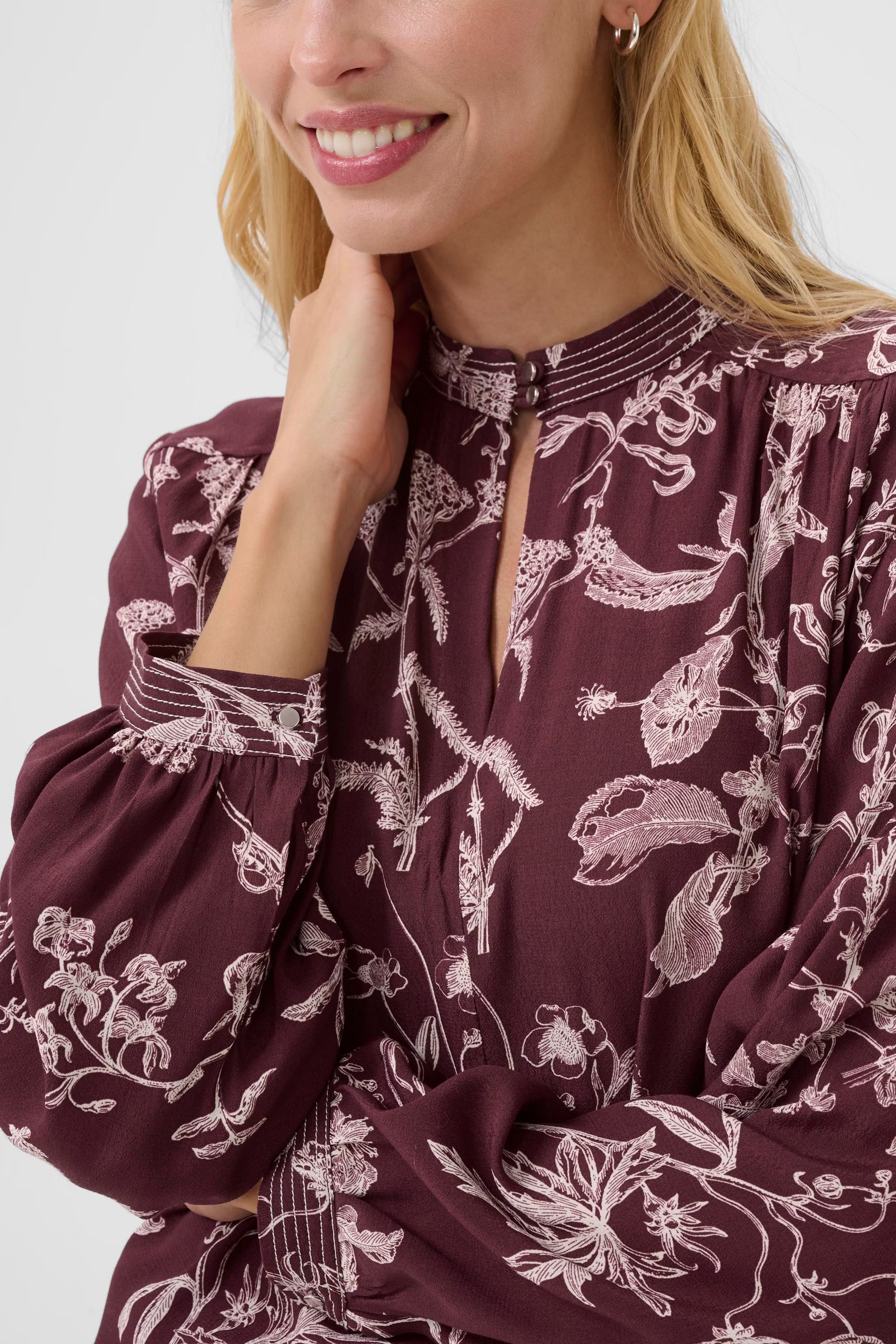 Close-up of Part Two Shiroma blouse neckline and cuff detail with floral embroidery