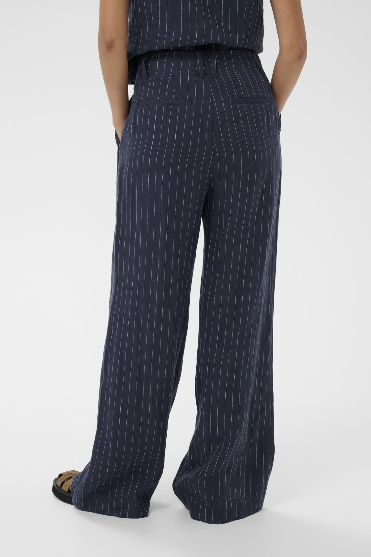 Part Two Aliya navy pinstripe trousers back pockets view wide leg fit