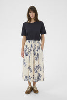 Part Two Amaia cream blue floral skirt styled with plain navy top