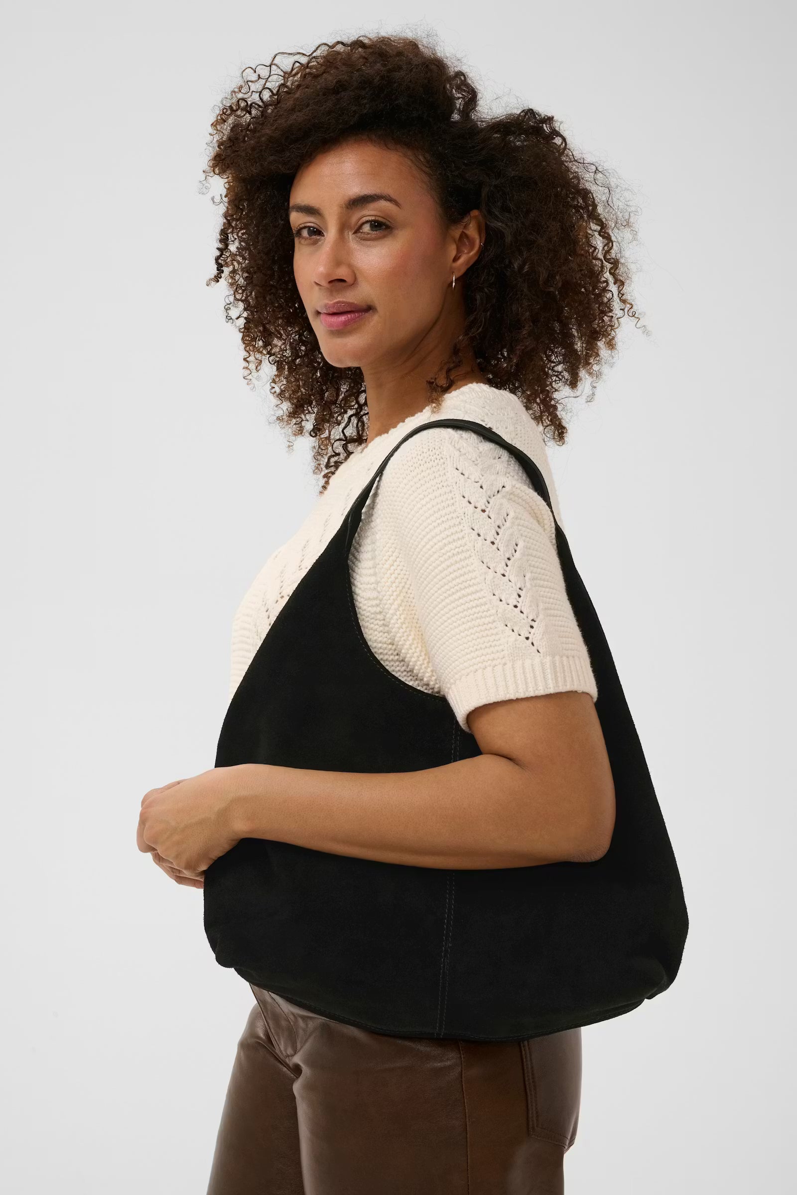 Part Two Athea suede slouch bag in black with curved shoulder handle