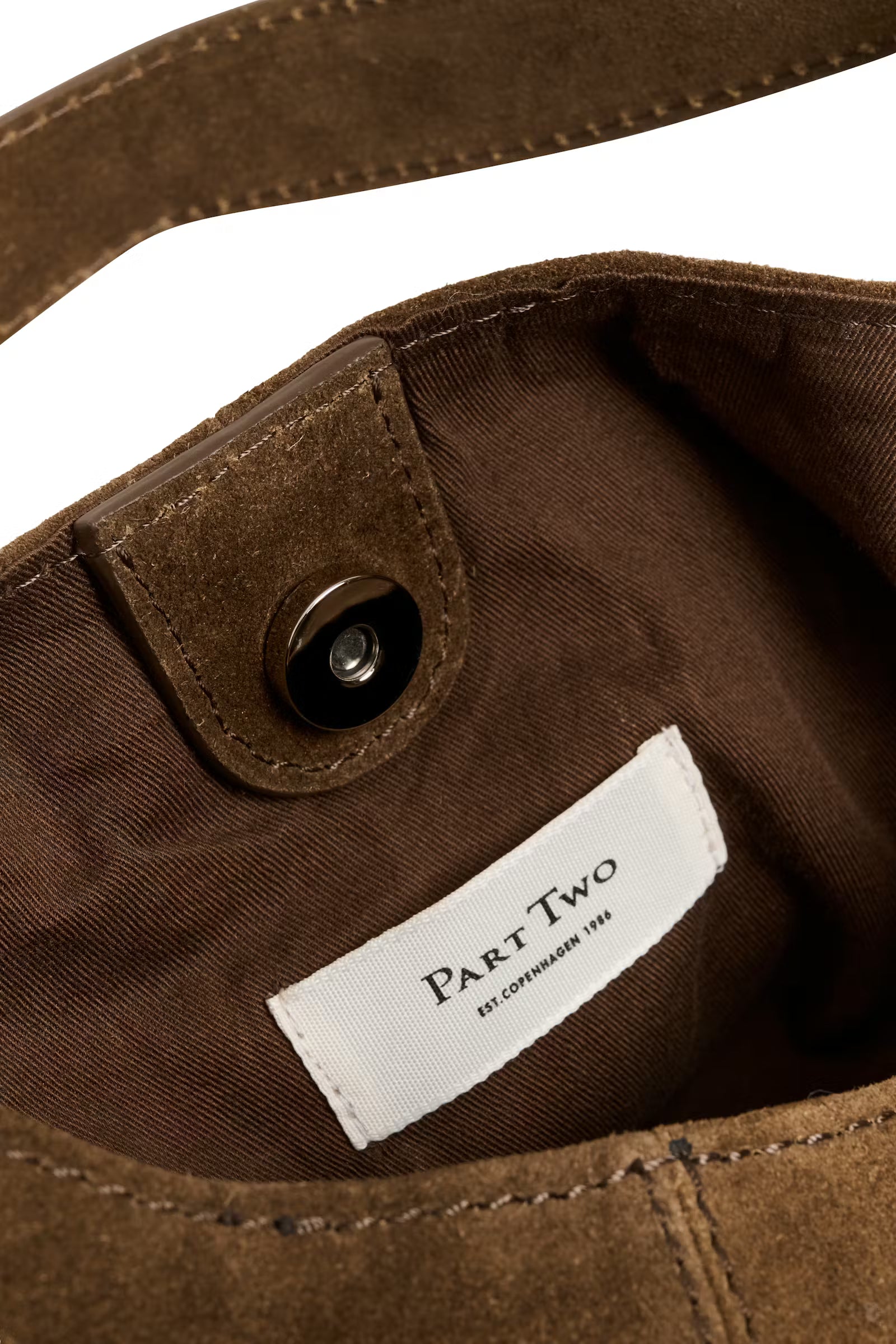 Part Two Athea brown suede bag interior with magnetic closure