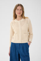 Part Two lightweight spring cardigan styled with blue trousers