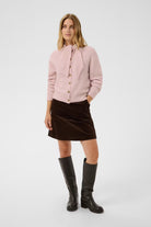 Part Two Chanie light pink scarf cardigan styled with skirt and boots