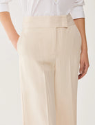 Penny Black cream pinstripe tailored trousers close up waistband detail