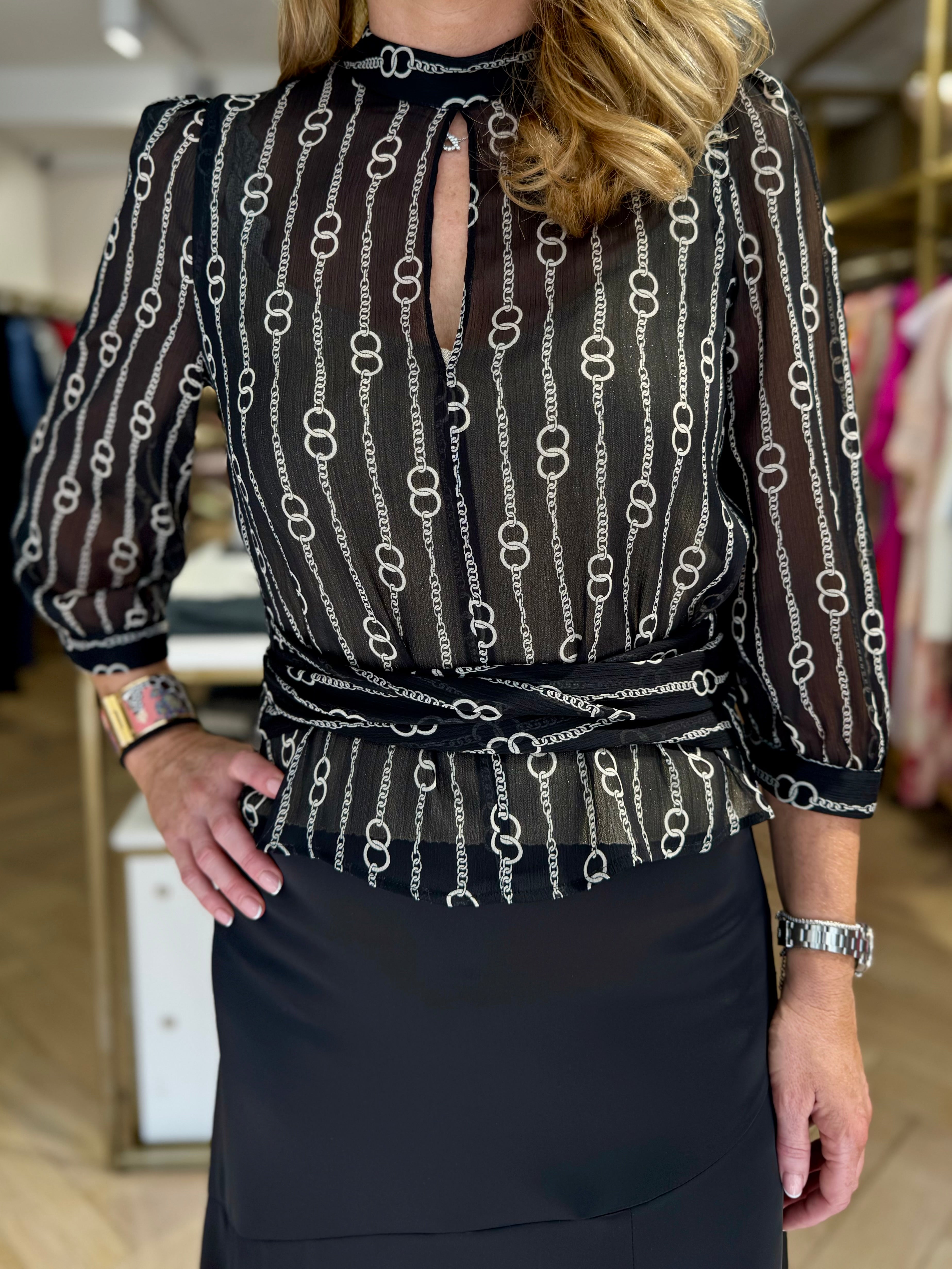 Close-up of chain motif pattern on Pennyblack Sesia blouse