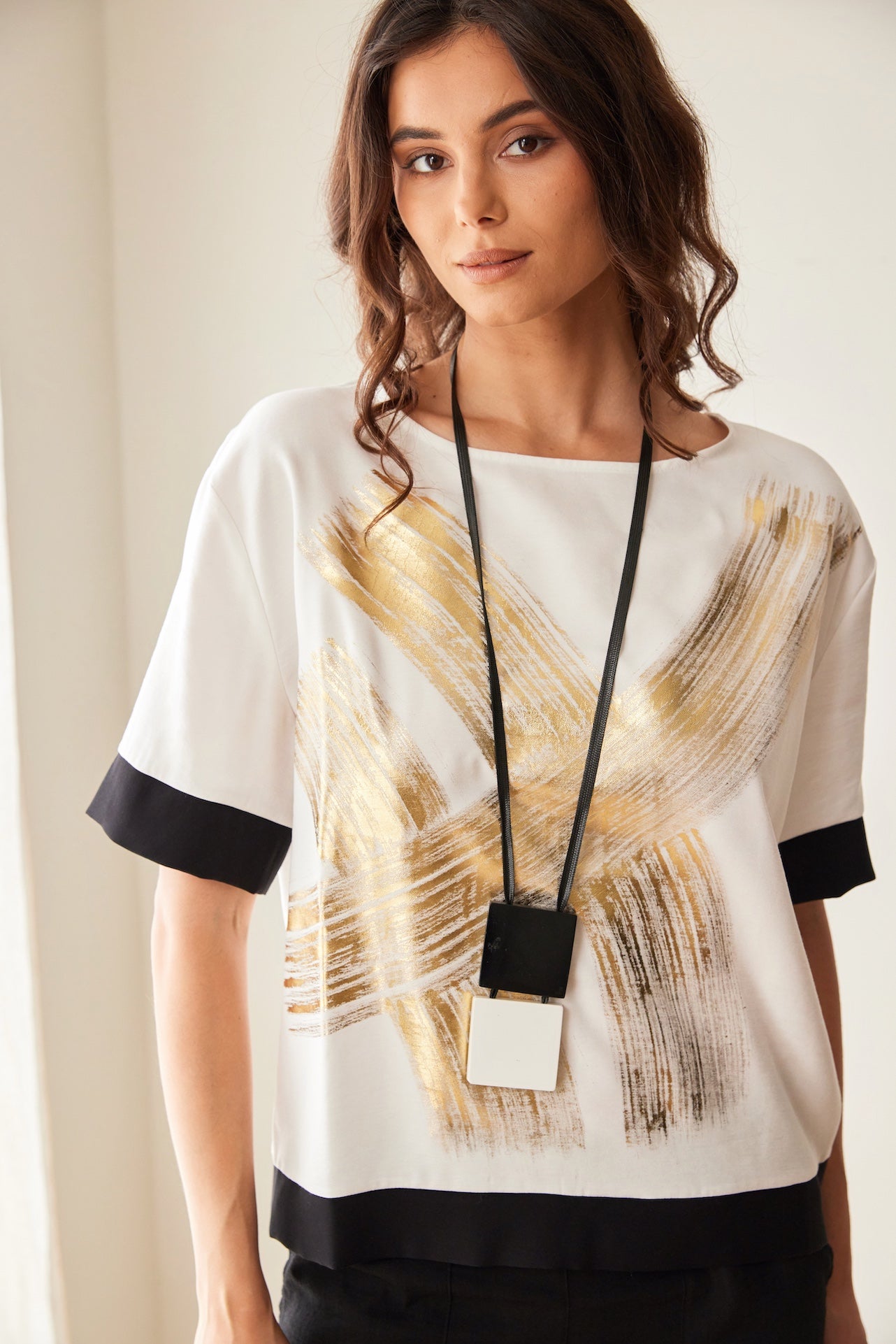 Peruzzi Metallic Brush Stroke Print Top front view with abstract metallic pattern