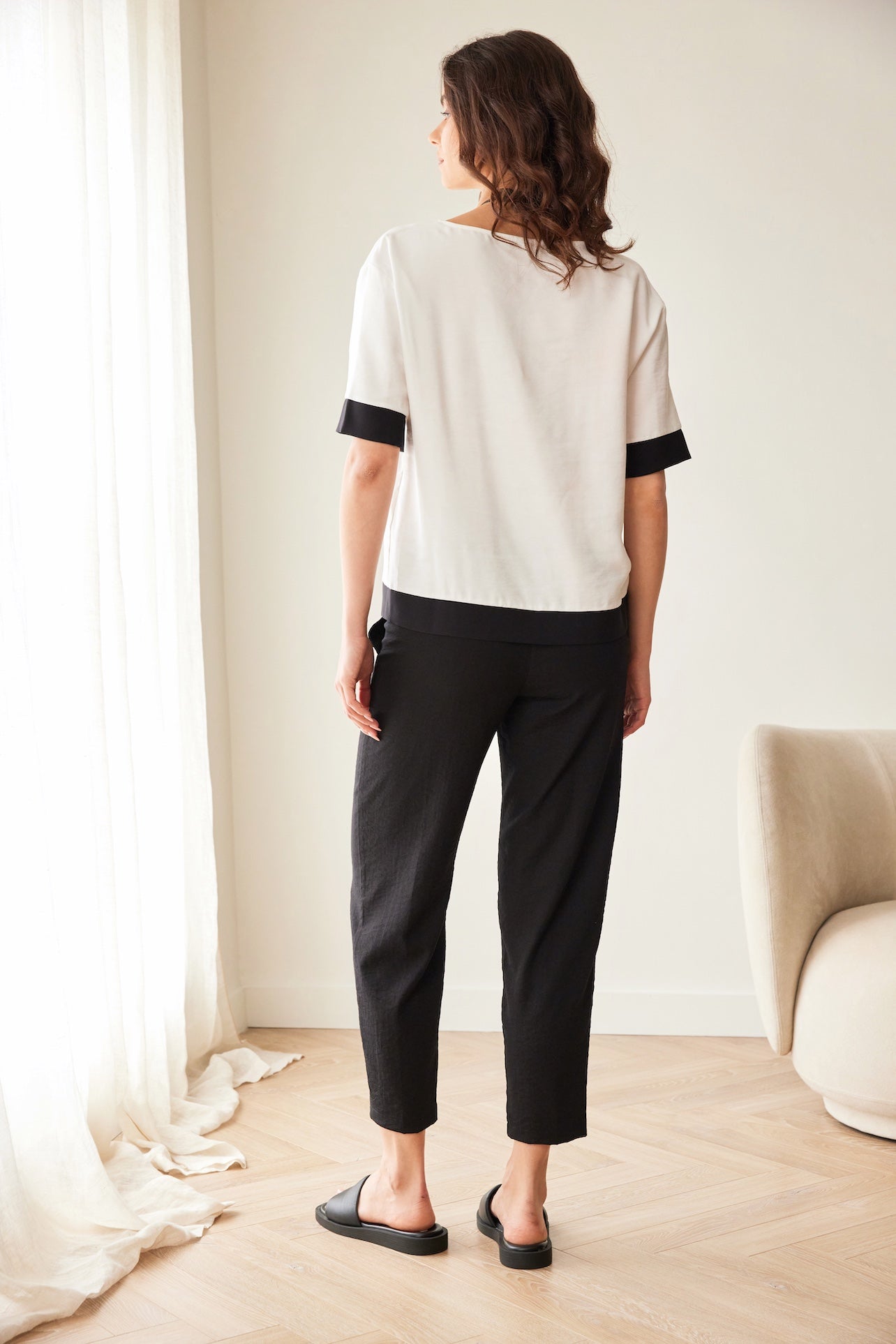 Peruzzi Metallic Brush Stroke Print Top back view with contrast hem and sleeve cuffs