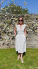 White broderie lace blouse styled with matching Aline broderie lace skirt 