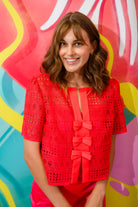 Sisters Java lace bow detail blouse in red textured lace