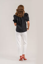 Sisters Jet black cotton blouse with gathered back and short puff sleeves