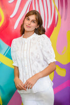 Sisters Jet white cotton blouse with gathered front and short puff sleeves