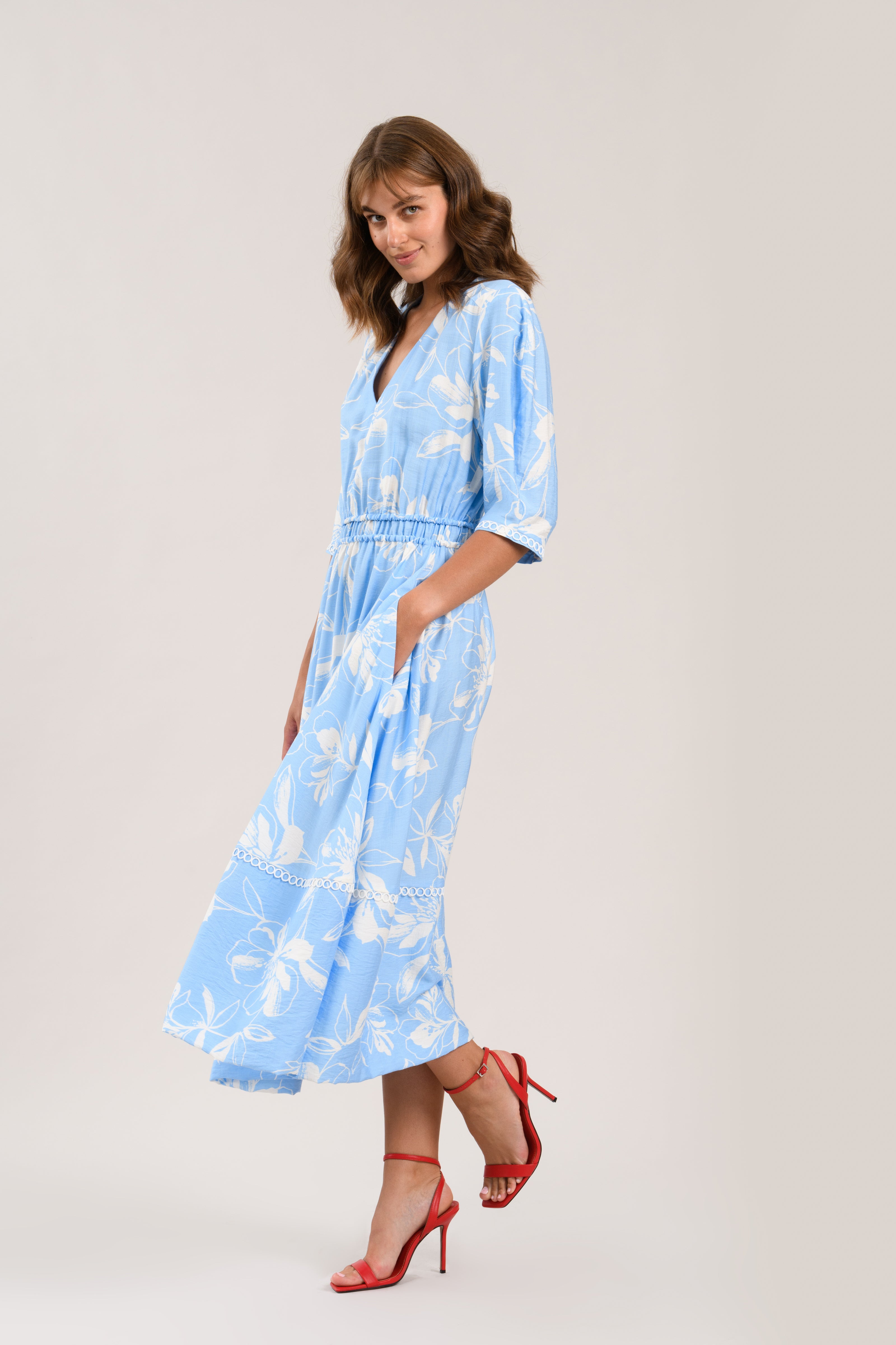 Sisters July blue floral puff sleeve midi dress front view with V neckline