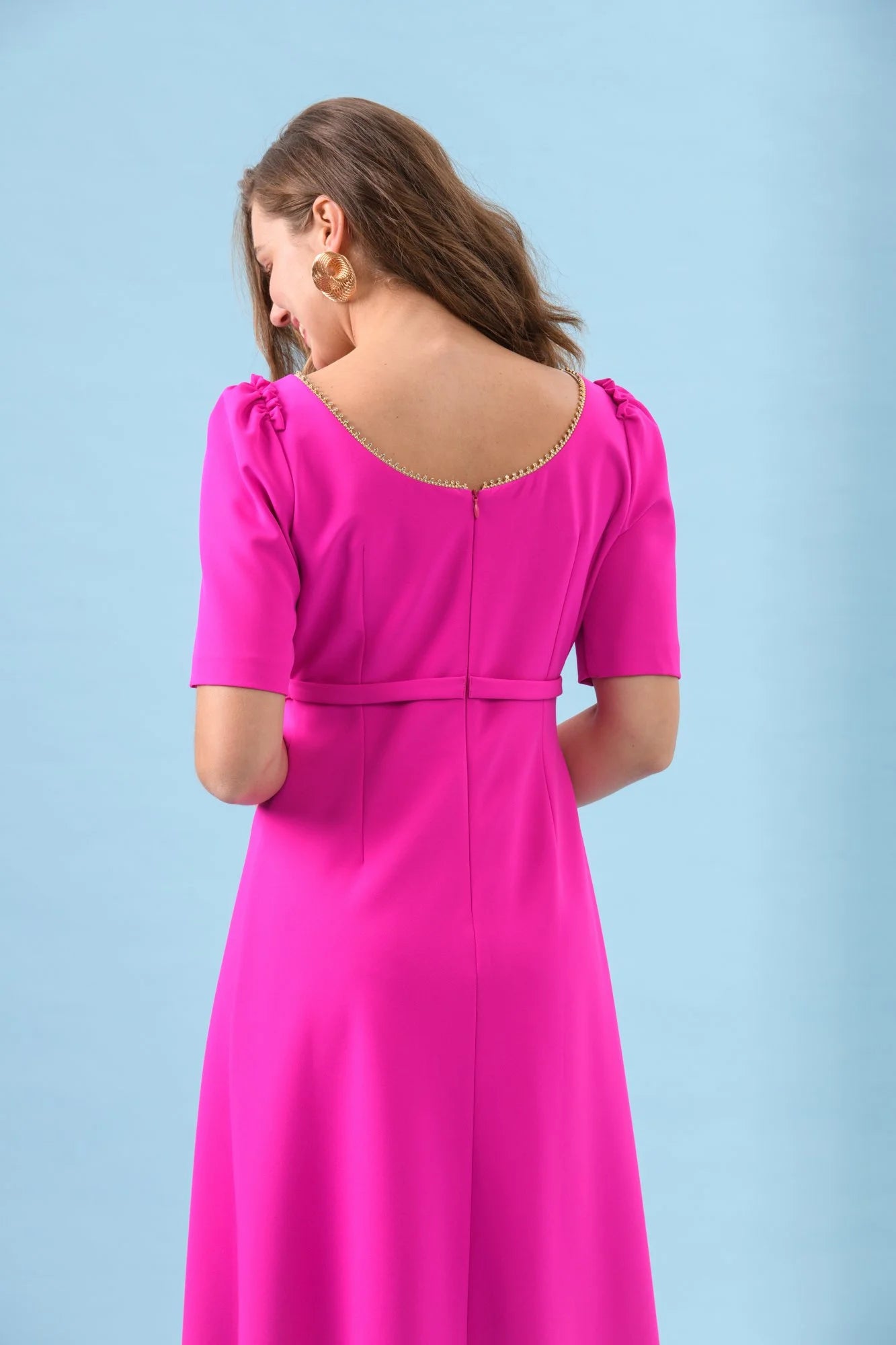 Back view of The Sisters Pearl fuchsia dress