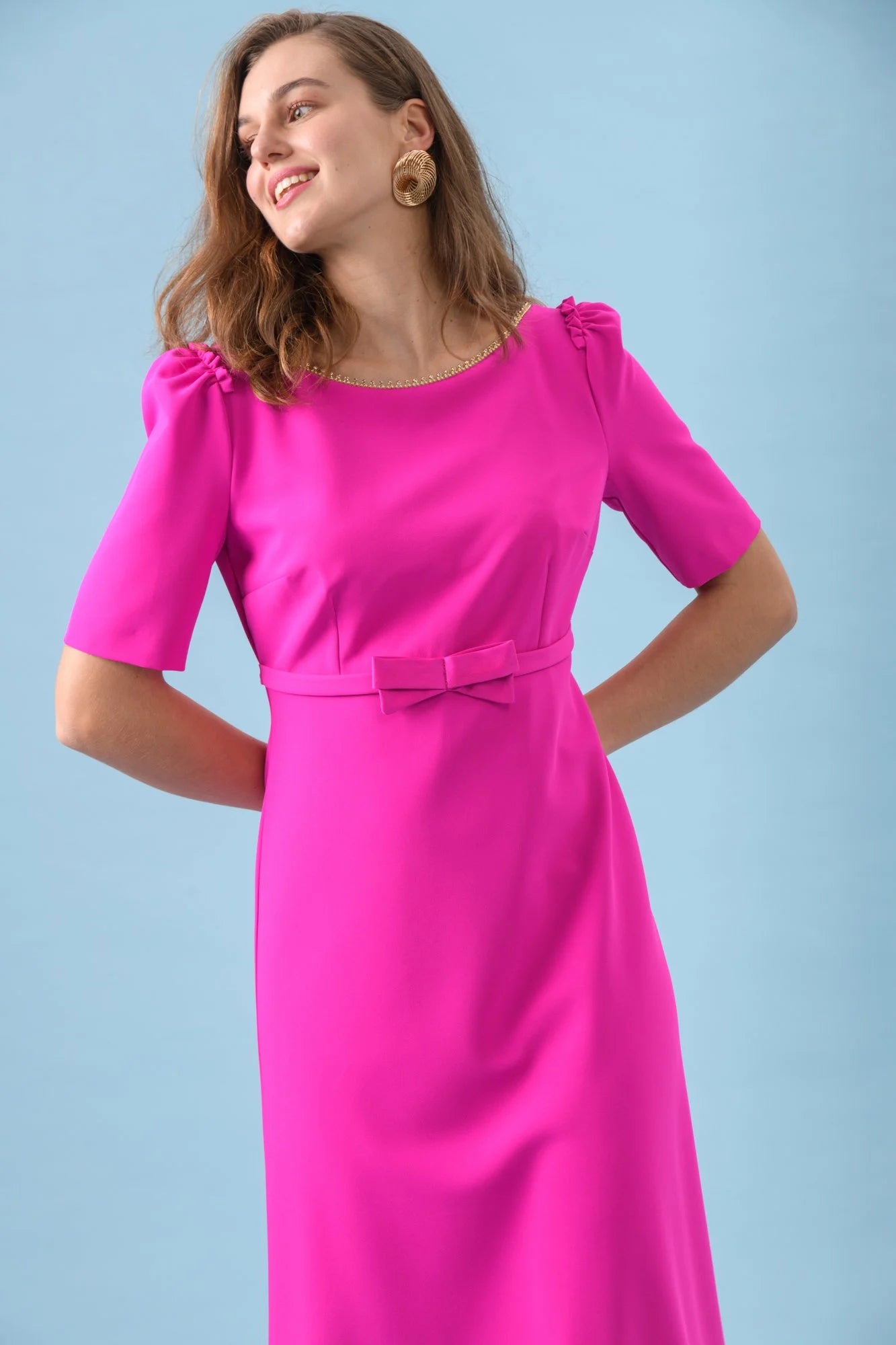 Side view of The Sisters Pearl midi occasion dress