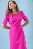 Side view of The Sisters Pearl midi occasion dress