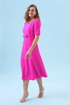 Puff sleeve fuchsia midi occasion dress with bow waist detail