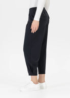 Side profile of Stehmann black jersey trousers with elastic waistband