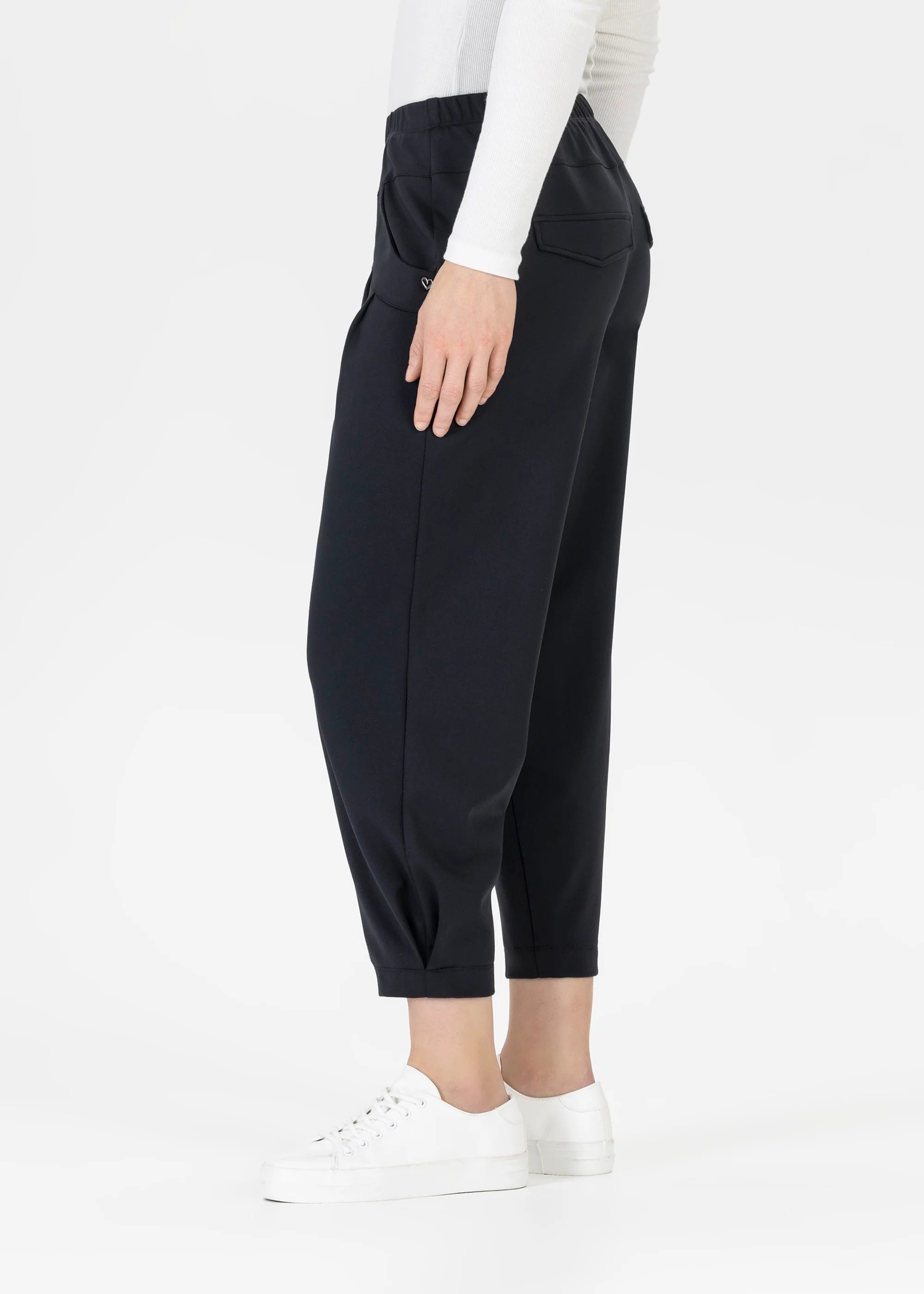 Side profile of Stehmann black jersey trousers with elastic waistband