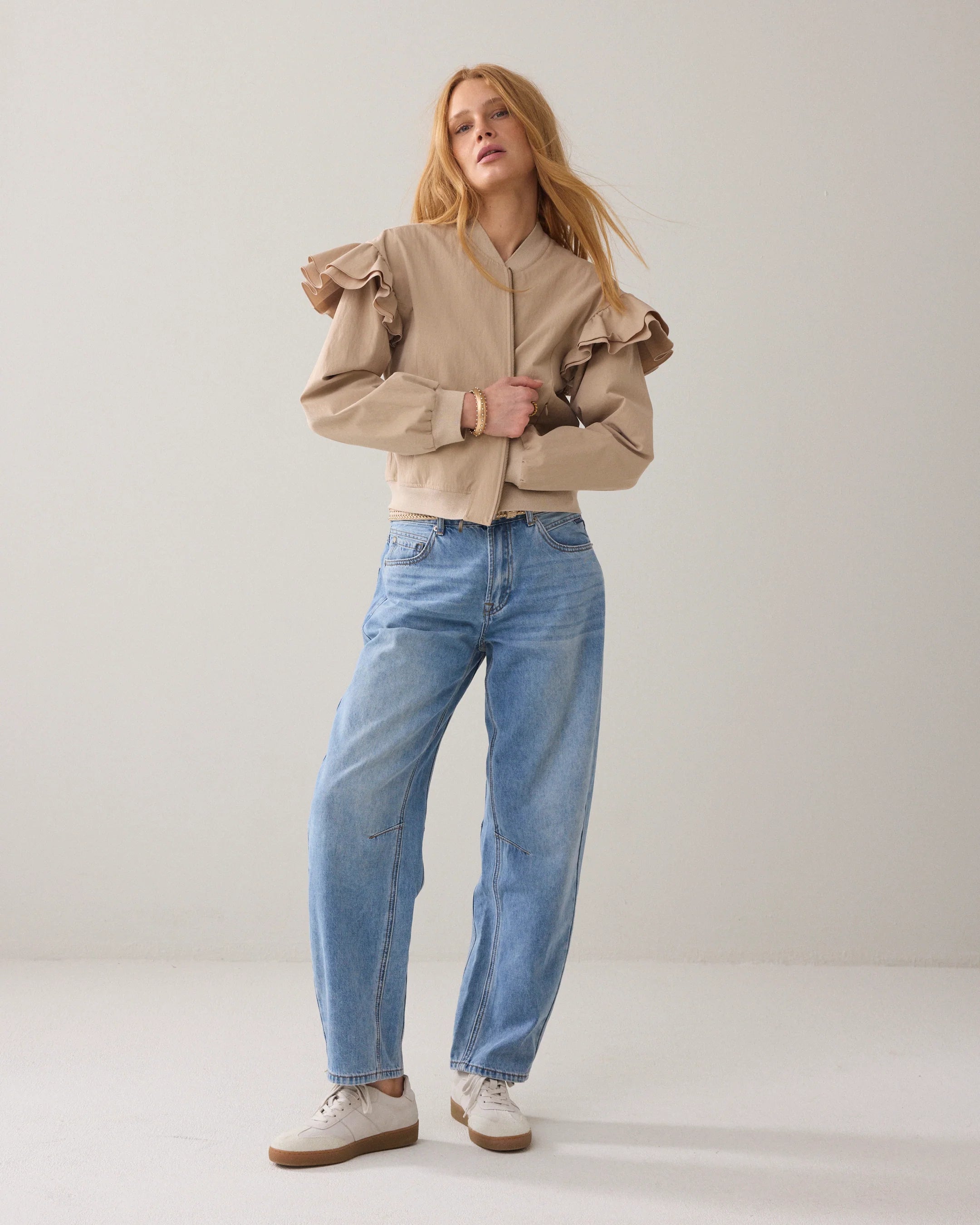 Side view of Summum bomber jacket with frill shoulder 