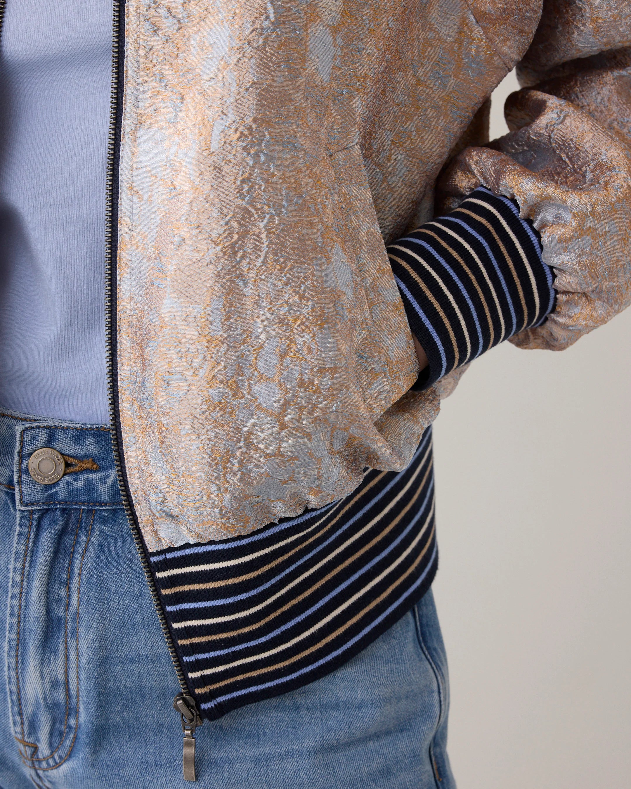 Summum jacquard bomber jacket close up of textured fabric and cuff