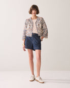 Summum embroidered jacket styled with denim shorts
