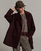 Summum burgundy wool blend coat styled with checked outfit