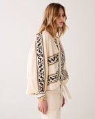 Summum damask blouse cuff detail scallop buttons close up