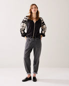 Summum black embroidered sleeve blouse front view V neck