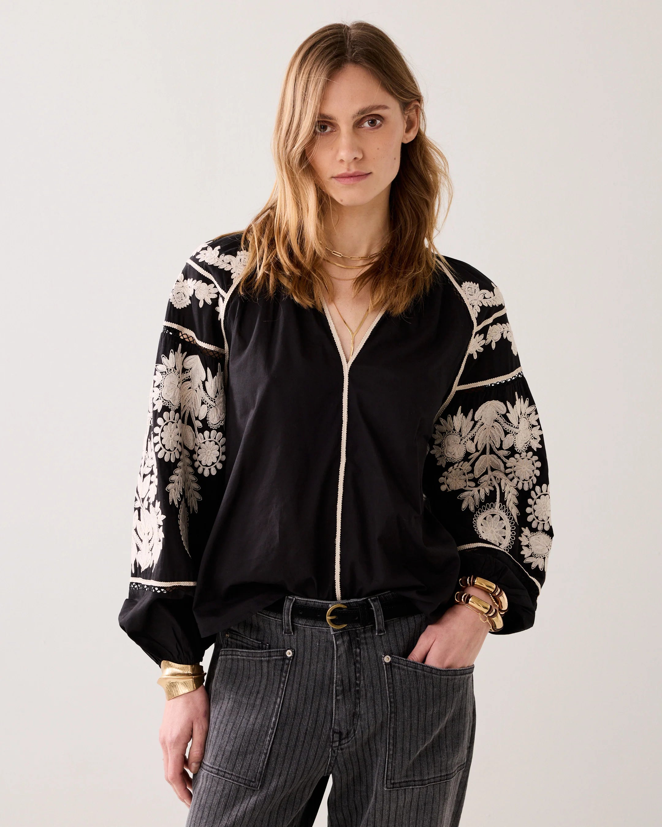 Summum embroidered puff sleeve top styled with grey trousers