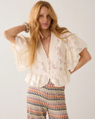 Summum cream peplum blouse with wide flounce sleeves