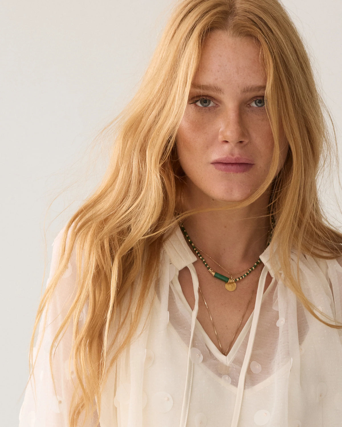 Summum cream embellished blouse – neckline and satin pleat detail
