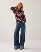 Summum striped blouse styled with wide leg jeans