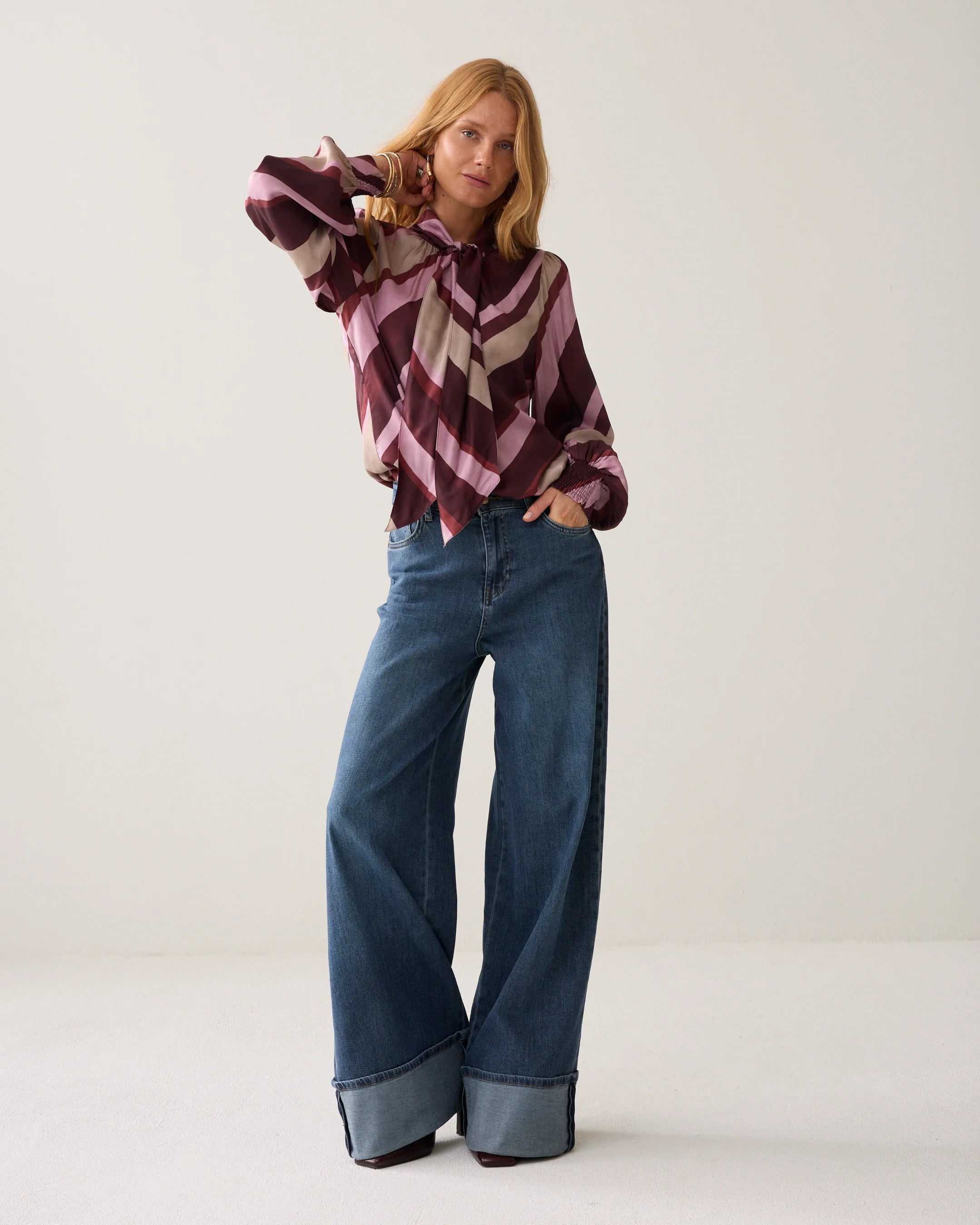 Summum striped blouse styled with wide leg jeans