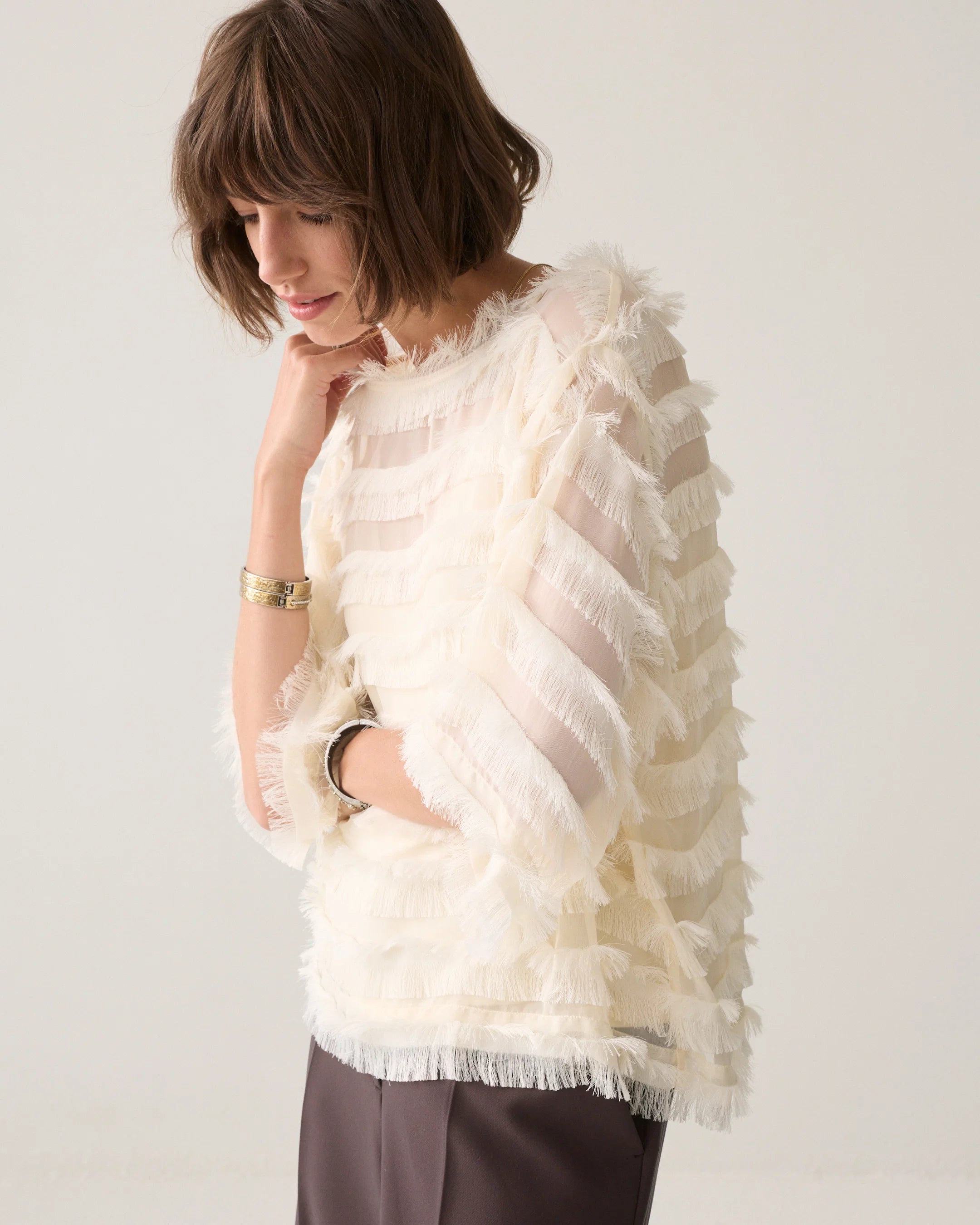 Summum cream sheer fringed top side view    