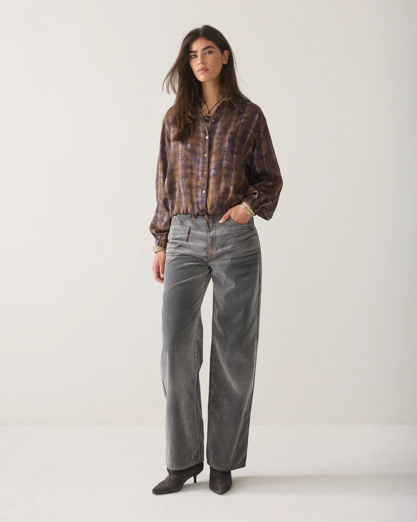 Summum brown and lilac floral cropped blouse styled with grey wide-leg trousers – full model view