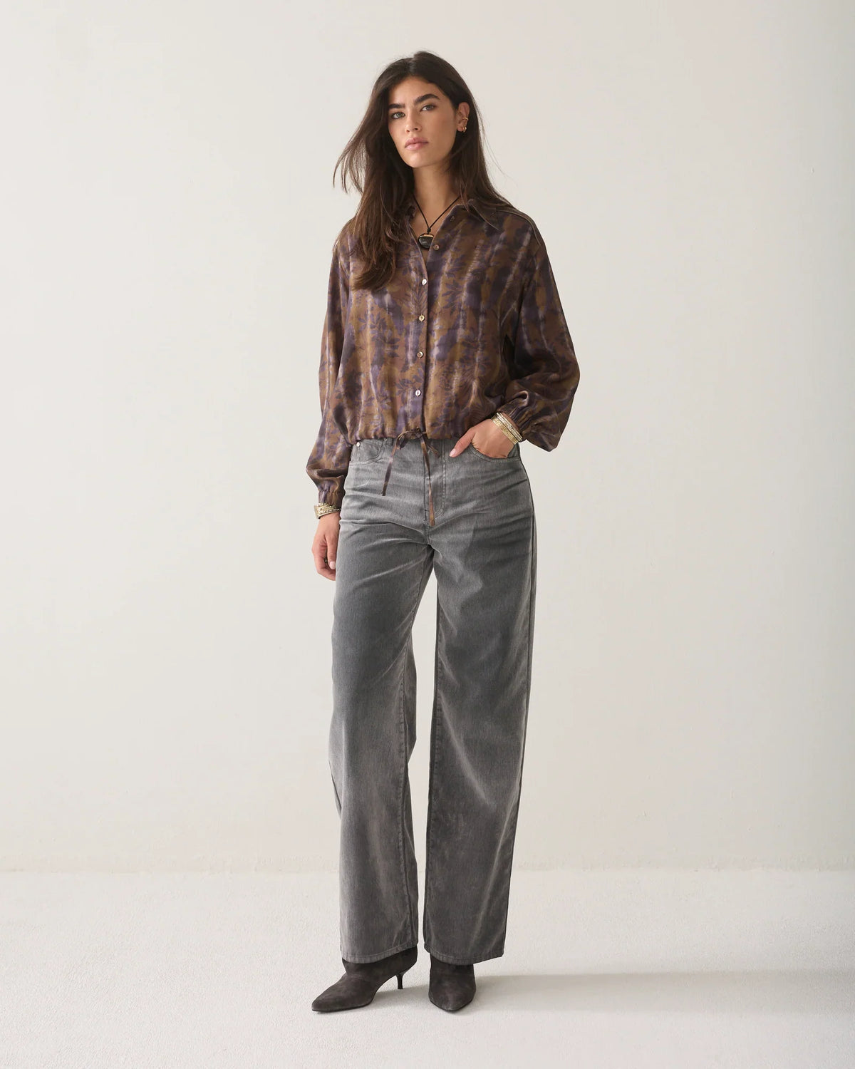 Summum brown and lilac floral cropped blouse styled with grey wide-leg trousers – full model view