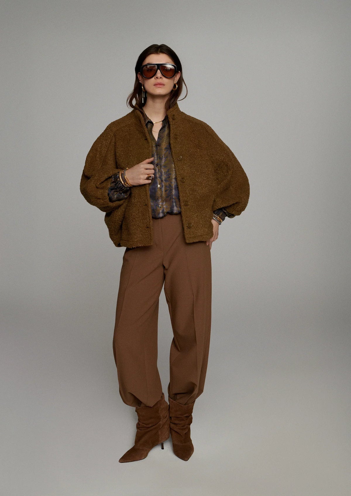 Summum Misty Flower cropped blouse layered under brown jacket with matching trousers