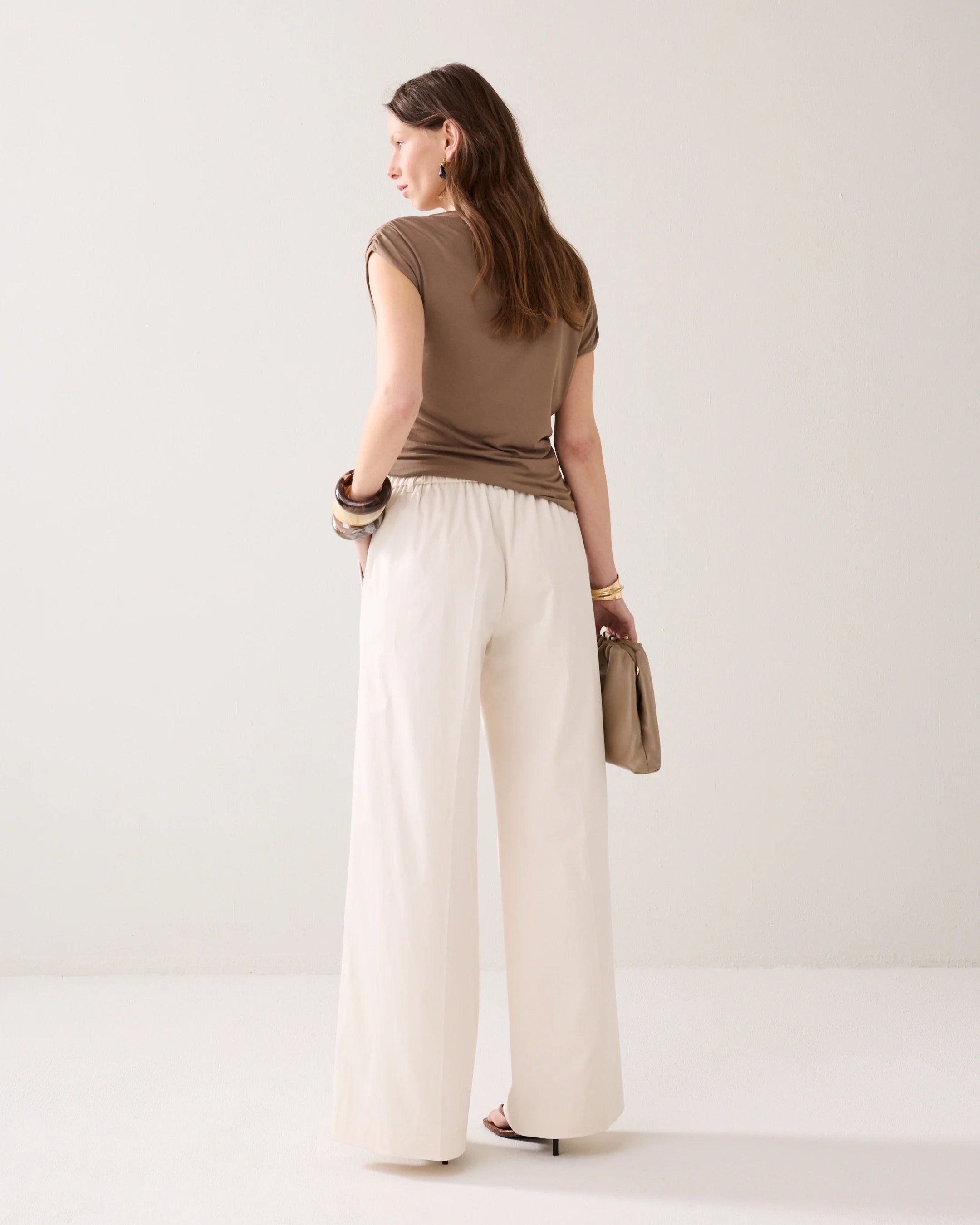 Summum cream trousers back view wide leg fit