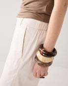Summum cream trousers waistband and side pocket detail