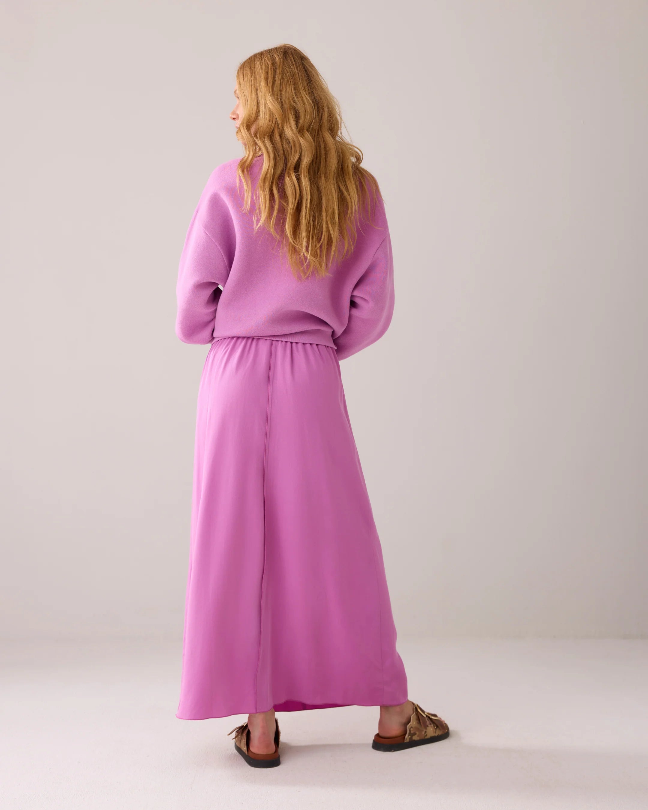 Back view of Summum Tencel skirt showing soft drape and casual styling with knit top