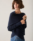 Summum navy asymmetric knit – draped front model view