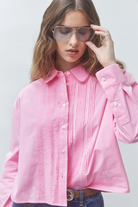 Suncoo Libre pink pintuck blouse with button front and cuffed sleeves – upper body view