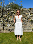 Suncoo Lila white broderie anglaise wrap top with side tie and ruffled sleeves