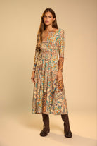 Tinta Lila teal and rust patchwork print long sleeve midi dress front view