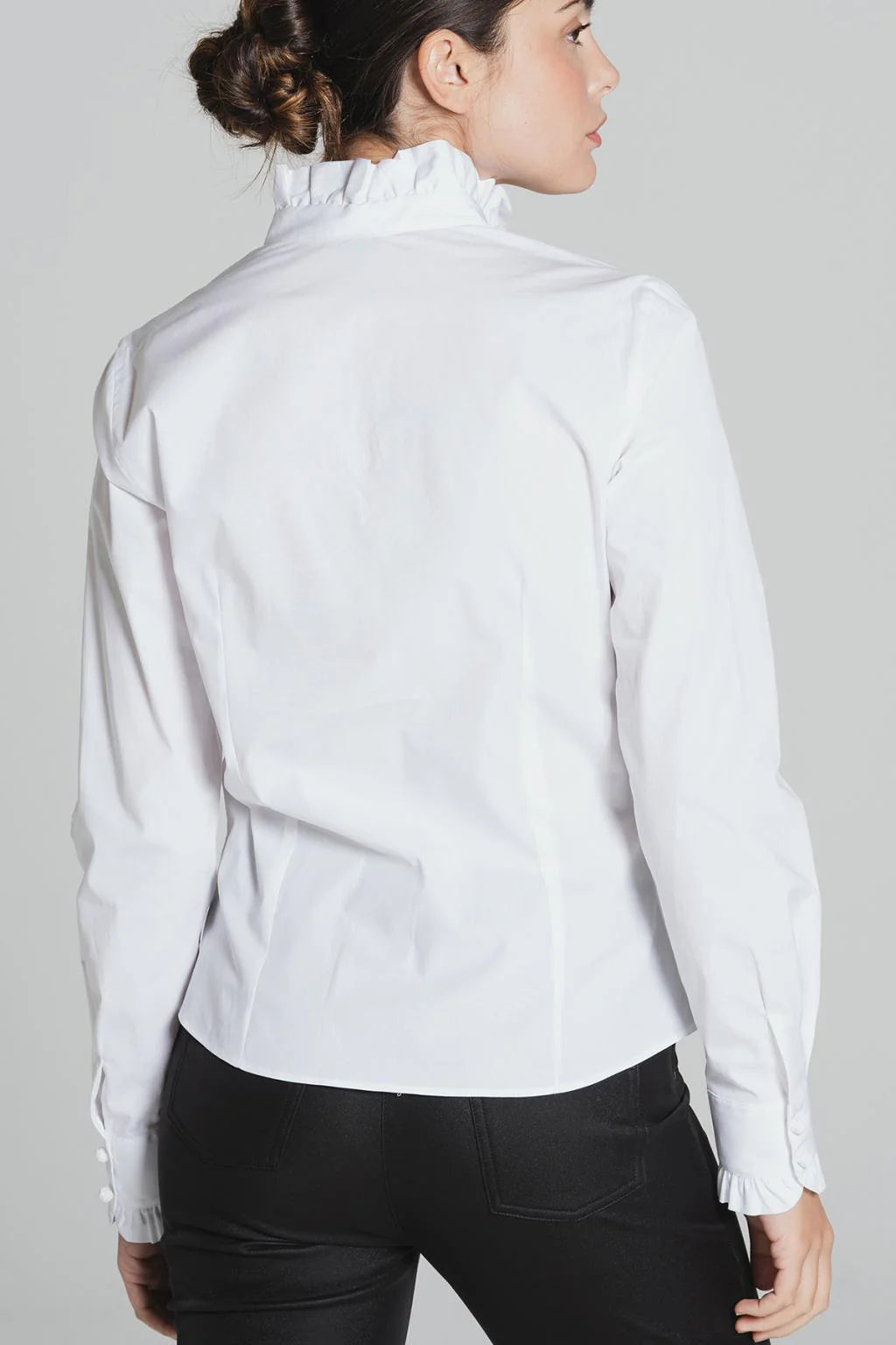 Back view of white Tinta Lucar fitted frill detail shirt