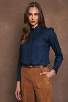Front view of Tinta Victoria navy blouse with smart cuff detail