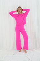 Twins Aurora neon pink relaxed crew neck jumper styled as a tonal set