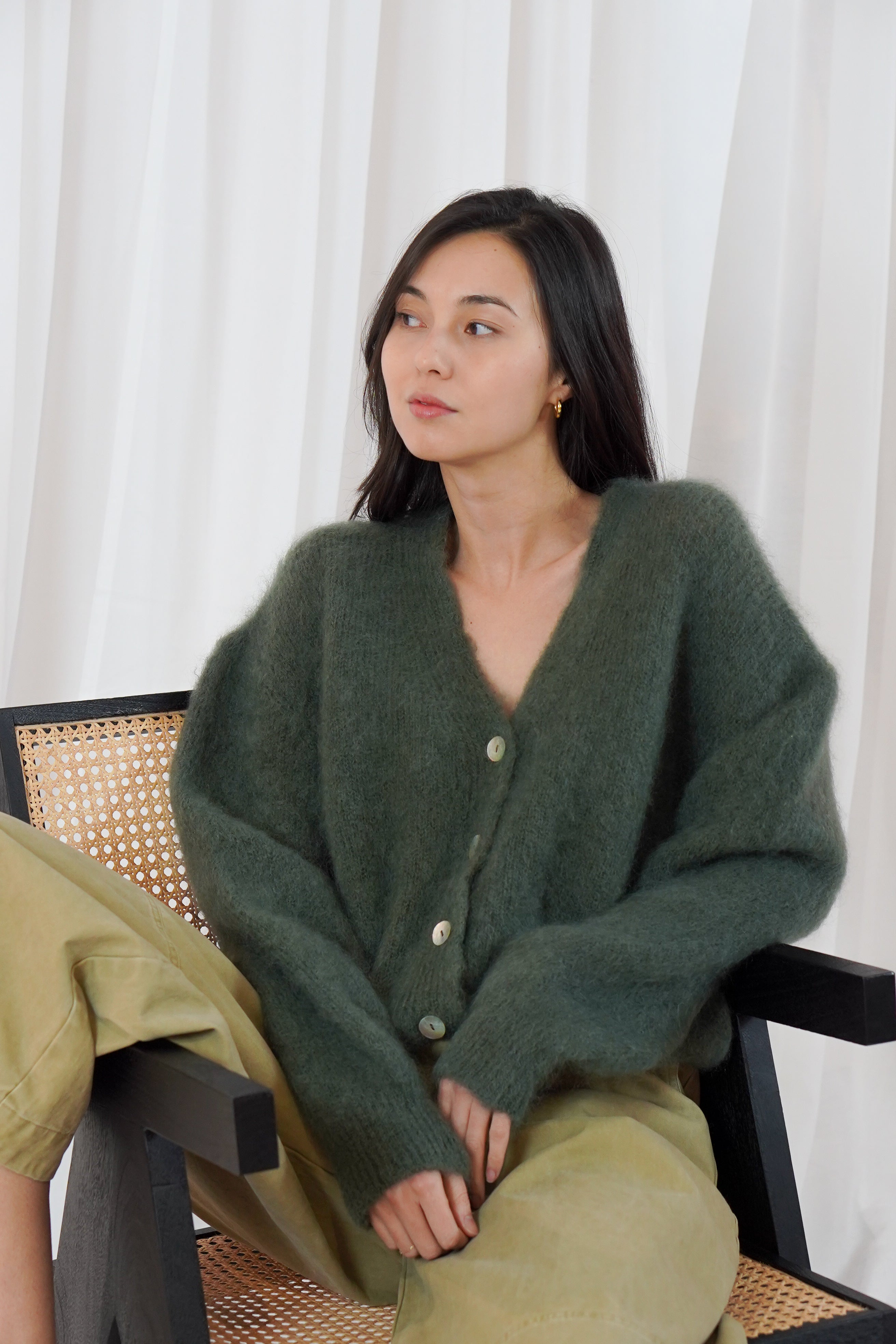Close-up of Twins Malia soft brushed mohair V-neck cardigan