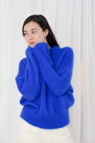 Twins Moana cobalt blue fluffy mohair jumper showing the gathered sleeves