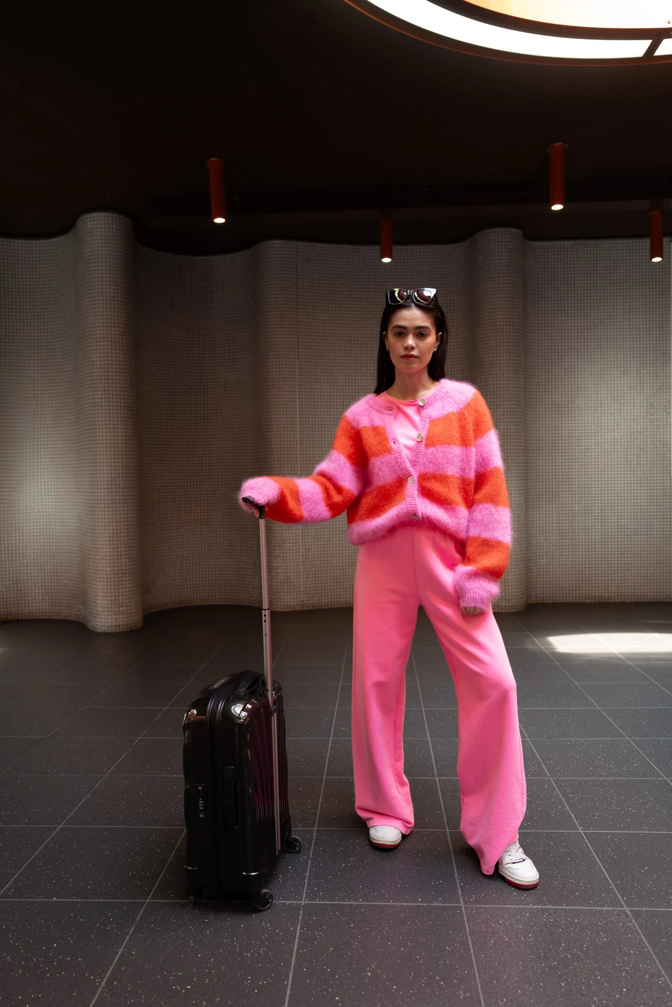 Twins Timea striped cardigan styled with pink trousers